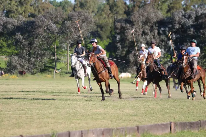 A polo match on the field at La Dorada